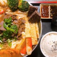 Satay Beef Hotpot · Napa, vermicelli, sliced beef, broccoli, crab stick, tofu, tempura, enoki mushroom, baby cor...