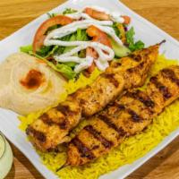 Chicken Kabob · Two skewers of delicious of all white chicken breast marinated overnight in spices and herbs.