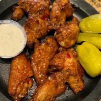 Sweet Chili Red Hot Wings · Shock the taste buds with the powerful, peppery punch of sweet red chili pepper! Fusing the ...