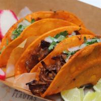 Birria Taco · Spicy beef stew meat marinated in mom’s multi-chile pod sauce.
Enjoy your choice of Chando's...