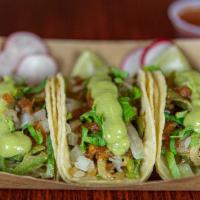 Veggie Taco · Perfectly sauteed anaheim peppers, onions, and mushrooms topped with fresh cilantro, delicio...