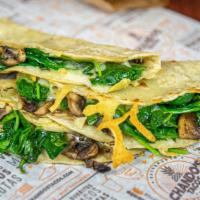 Spinach Taco · Perfectly sautéed spinach, onions, cheese, and mushrooms topped with fresh cilantro, delicio...
