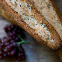 Baguette Multigrain · Award winning artisan bread featuring roasted multigrain mix: oats,flax seed, poppy seed and...