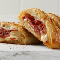 Individual Pepperoni Stromboli · Our signature cheese blend and fresh baked pepperoni’s rolled in made-from-scratch dough the...