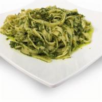 Fettuccine Chicken Pesto · A generous portion of fettuccine smothered in a basil pesto sauce with grilled chicken breast.