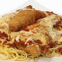 Chicken Parmesan · Lightly breaded chicken breasts baked and smothered with cheese and marinara sauce over spag...