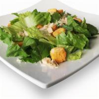 Caesar Salad · Romaine lettuce, croutons, shaved parmesan cheese & Caesar dressing.