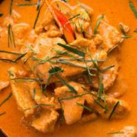 Panang Curry · Choice of protein, red panang curry with peas and carrots, zucchini, bell peppers and jalape...