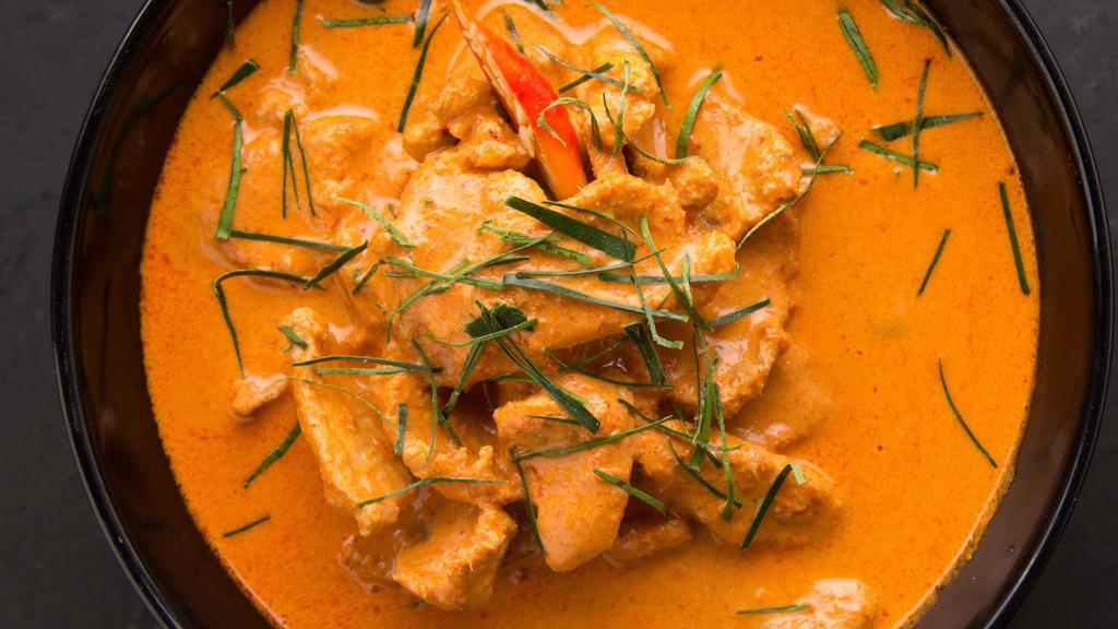 Panang Curry · Choice of protein, red panang curry with peas and carrots, zucchini, bell peppers and jalapeno.