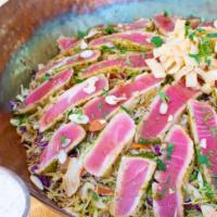 Ahi Salad Platter · Seared ahi marinated in chimichurri, Asian slaw, toasted almonds, wonton strips, cilantro, a...