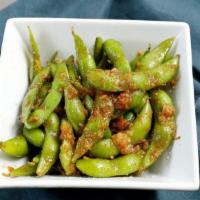 Steamed Edamame · Our steamed edamame tossed in sea salt.