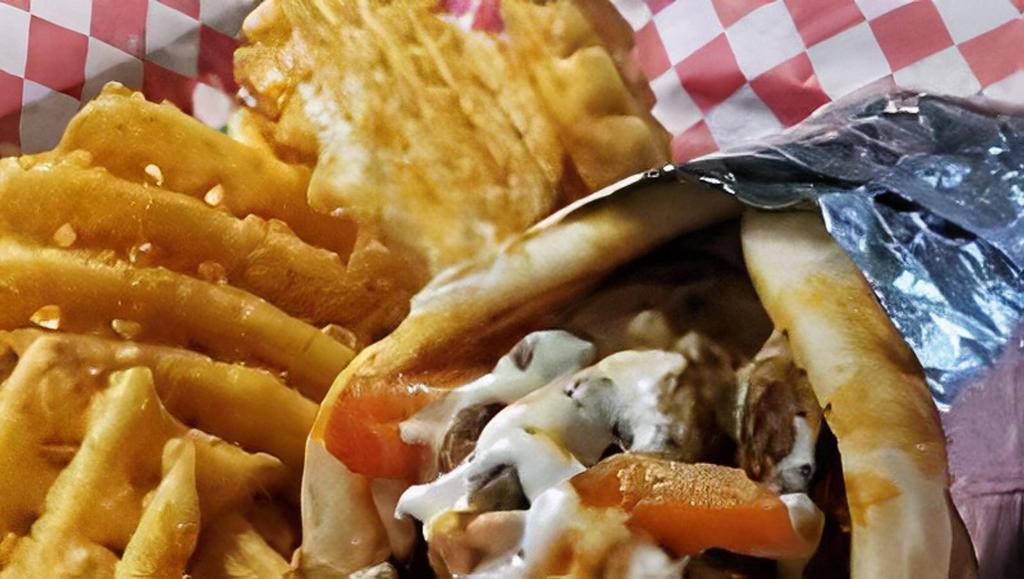 Gyro Philly Meal  · Lamb & Beef mixed gyro with grilled onions, bell peppers, and cheese, topped with house ranch on pita bread.
(MEAL DEAL comes with French fries/Waffle fries or house salad with a soft drink.)