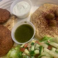 Falafel Plate · Fresh homemade falafel served with hummus, pita bread, lettuce and veggies (tomato, cucumber...