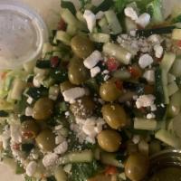 Large Greek Salad · Lettuce, veggies (tomatoes, cucumber & celery), olives and feta cheese with side tzatziki an...