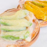 Turkey Avocado Melt · Breast of turkey on a bagel, open-faced with fresh avocado, topped with tomato slices, Russi...