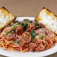 Spaghetti · Served with garlic bread.