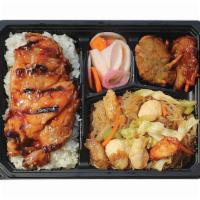 Grilled Bbq Chicken Filet Bento Bx · Served with Pancit Bihon, Fish Fritters, Pickled Radish, and Rice.