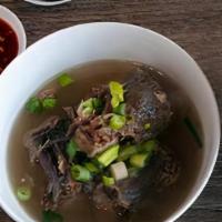 Pho Oxtail · Favorite. Braised oxtail meat, served on a bed of rice noodles with scallions and onions, in...
