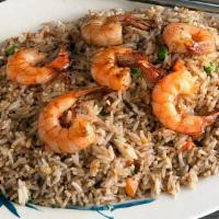 Shrimp Fried Rice · Fresh cuts of shrimp cooked in a wok, tossed, and fried with rice, egg, butter, peas, carrot...