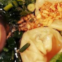 Dumpling Soup · Steamed tofu-stuffed dumplings with spinach in veggie broth topped with fried crushed garlic.