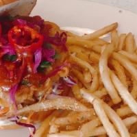 Crispy Chicken Sanwich · Crispy soy chicken topped with slaw,pickled cabbage ,freshno chili &buffalo sauce