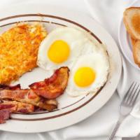 Highway Treat · This includes two large grade AA eggs with your choice of three pieces of smoked bacon or th...