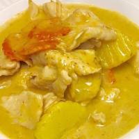 Yellow Curry (Kaeng Ka-Ree) · With potatoes, carrots, onions and coconut milk.
