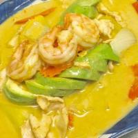Avocado Curry · Yellow curry, chicken and shrimp, potatoes, carrots, onions, coconut milk.