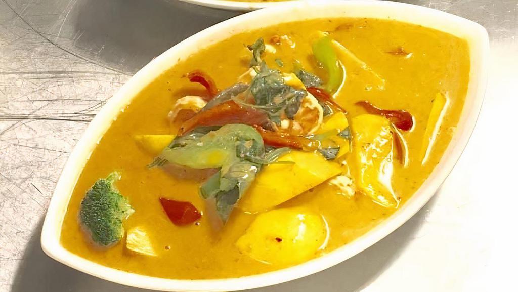 Mango Or Pumpkin Curry · Creamy red curry sauce come with chicken and shrimp, bell peppers, Thai basil and coconut milk.