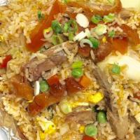 Duck Or Tilapia Fried Rice · Pan fried rice with egg, peas and carrots, onion, tomato and fresh cucumber.
