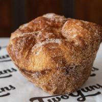 Croissant Cinnamon Roll · Flaky butter croissant dough rolled in cinnamon and sugar.