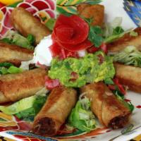 Taquitos And Guacamole · Chicken or shredded beef.
