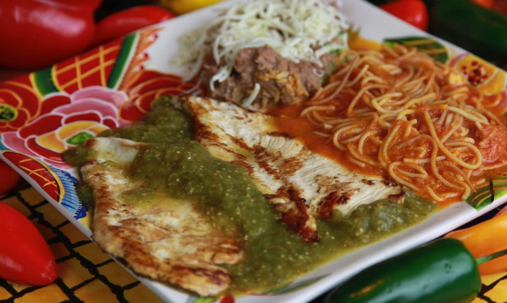 Pollo En Salsa Verde · Charbroiled Chicken Breast over Cilantro Verde Sauce 
Served with Fideo & Beans