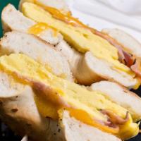 Egg, Ham & Cheese · Bagel Sandwich of your choice with Ham & Scrambled Eggs with Melted Cheese.