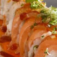 Baked Salmon · Inside (spicy crab, cream cheese, shrimp tempura) outside (salmon baked with spicy mayo, eel...