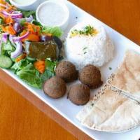 Falafel Plate · Flavorful blend of ground chickpeas seasoned with spices and served with tahini sauce.