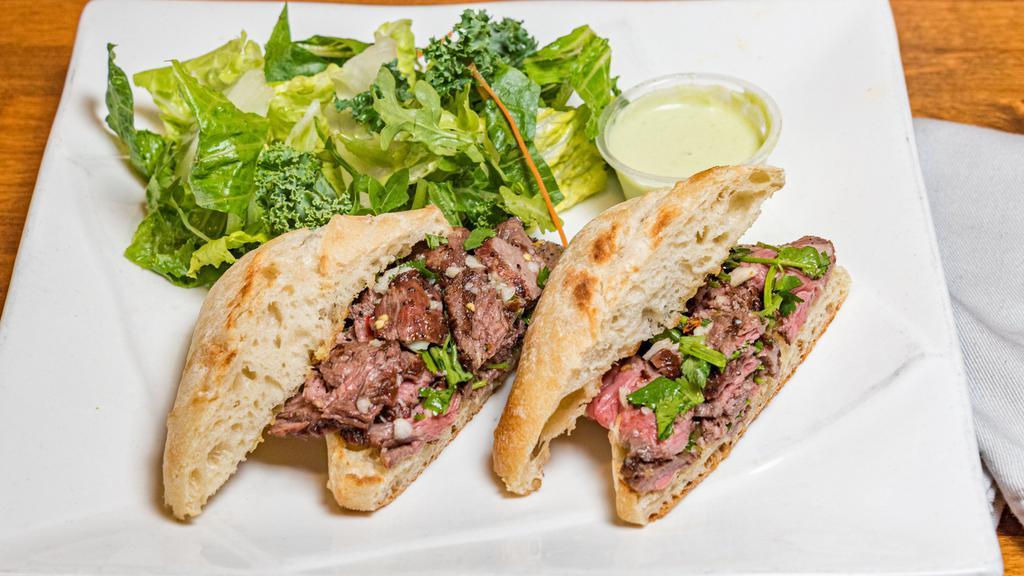 Steve'S Steak Sandwich · Our most popular sandwich! USDA prime beef, grilled medium rare, thinly sliced and loaded onto a torta. Topped with a spicy Peruvian chimichurri sauce