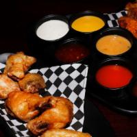 50Pc Party Pack
 · 50 Boneless or Classic (Bone-In) wings with up to 4 flavors, 2 large fries, and 4 dips. (Fee...