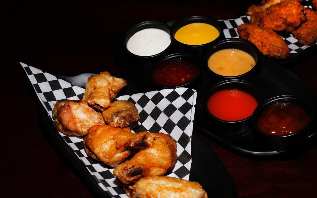 15Pc Meal For 2
 · 15 Boneless or Classic (Bone-In) wings with up to 2 flavors, large frie, 2 dips and 2 drinks