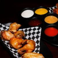 Wings (15) · 15 boneless or classic (bone-in) wings with up to 2 flavors.