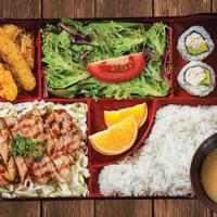 Teriyaki Chicken Bento · Teriyaki chicken served with rice, miso soup, house salad, assorted tempura and two piece ca...