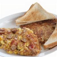 Breakfast Quesadilla · Choice of meat (bacon, sausage, or ham) with melted jack cheese.