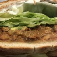 Torta · Choice of asada, al pastor or chicken. Served on a toasted torta bread, mayo, lettuce, tomat...