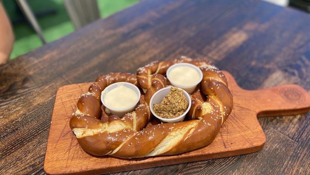 Bavarian Pretzel · Served with beer cheese and whole grain mustard.