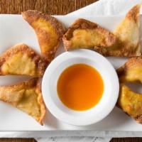 Crab Rangoon · Seven (7) pieces. Deep fried wontons stuffed with cream cheese and crab meat.