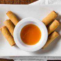 Fried Spring Rolls · Six (6) pieces. Wrapped vegetarian rolls of cabbage, carrot and glass noodles, served with s...