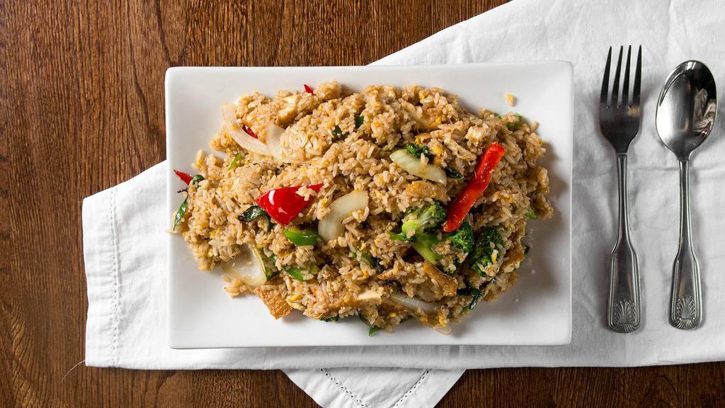 Spicy Fried Rice · Egg, onion, bell pepper, broccoli and basil.