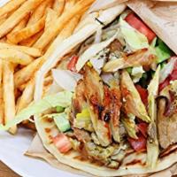 Chicken Shawarma Sandwich Combo · Dairy-free. Served with tomato, cucumber and garlic sauce. Tzatziki on the side. Includes ch...