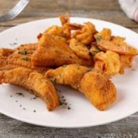 Fish & Shrimp Combo · A medley of two pieces of fish and 6 shrimp served grilled or fried with two sides.  Option ...