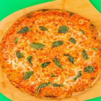 Margherita Pizza · Hand-stretched dough with Mozzarella, basil, tomatoes and olive oil sauce.
